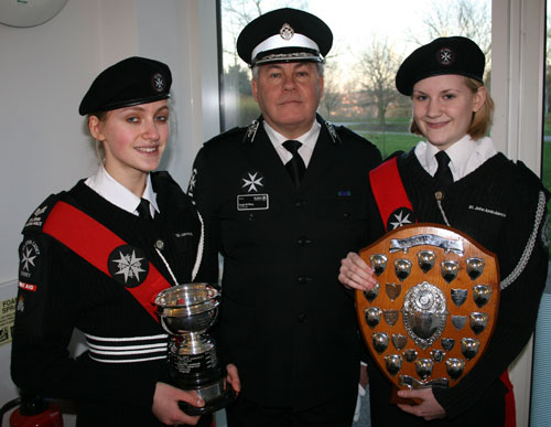 Commander Hugh Riley JP with Millie Clark and Rebecca Staunton.