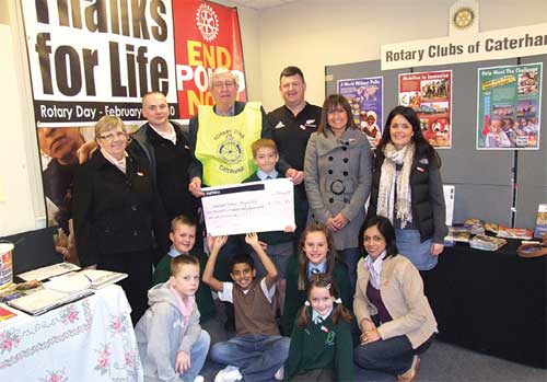 On Saturday, 27th February schoolchildren from Hamsey Green Junior School and some of their parents visited the shop in Station Avenue to present a cheque to the Rotary Clubs for £1,254.85. The generous amount was raised through their sponsored keep fit project. The photo shows Deputy Head, Linda Etheridge, far left and President of Caterham Rotary, Jim Burton (centre) with the group from Hamsey Green Junior School.