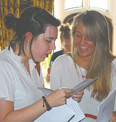 Woldingham girls take in the good news.