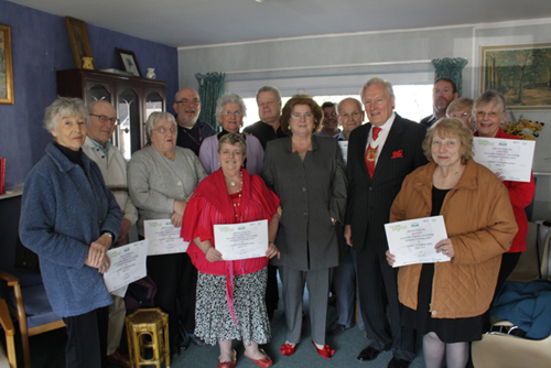 Councillor Brian Perkins(front right) and his wife Sonia with IT course graduates and staff in Warlingham this week. 