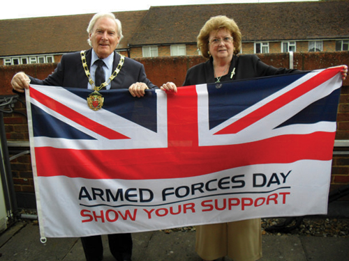 Chairman of the Council, Councillor Brian Perkins and his wife Sonia at the raising of the flag last Monday. 