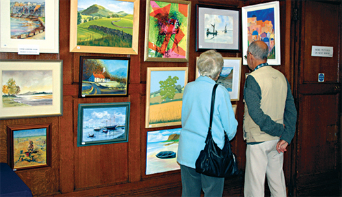 Visitors browse amongst the exhibits at the Soper Hall. Photo by Stephanie Bourazanis.