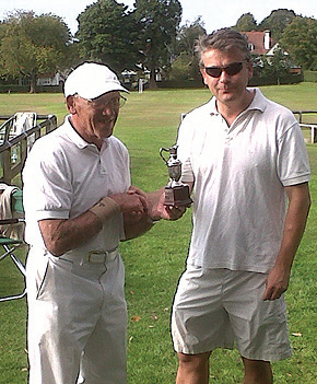 Philip Brabazon of Purley Bury presents the cup to John Gilbert of Caterham.