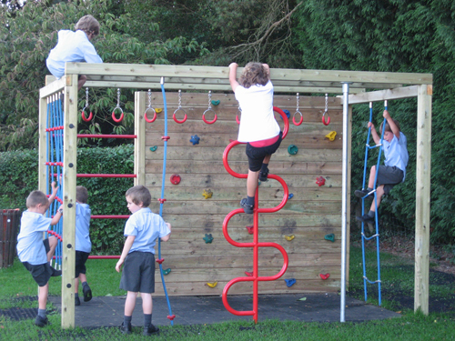 Children try out the new climbing frame at the Craigmyle Glebe playground.