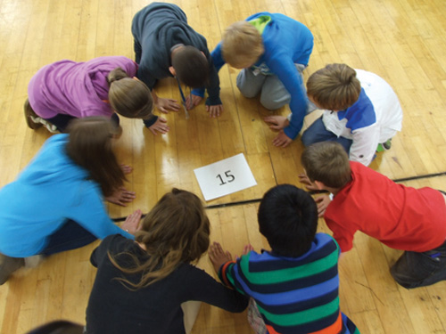 Year 7s  work together in a team game.