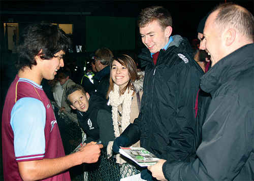 West Ham player, Brian Montenegro, signs autographs after the match against Whyteleafe FC.