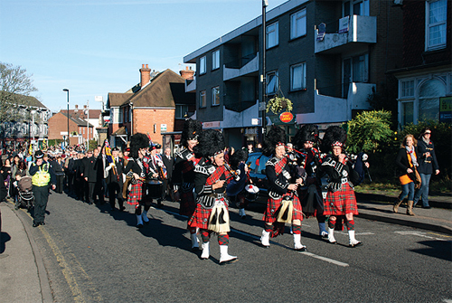 The Surrey Pipe Band at the head of the parade in the High Street, Caterham-on-the-Hill, on Remembrance Sunday.