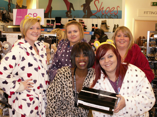 Staff in Dorothy Perkins raise funds in their pyjamas and dressing gowns.  Photo by Shelley Filippi.