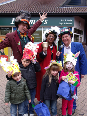 The Easter Bonnet competition winners with the Mad Hatter, Sonia Hunt Town Crier and DJ Chris.' 