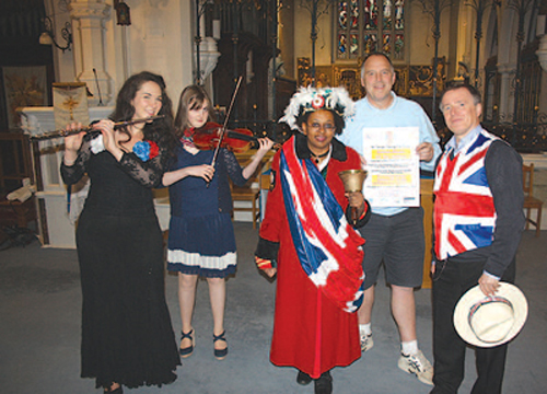 From left, Flautist Julie Groves, violinist Phoebe Goddard, Town Crier Sonia Hunt, Caterham Festival chairman, Andy Parr and Cllr Jeremy Webster of the Tandridge Community Fund at St. Mary’s Church in Caterham to promote the British Music for the Jubilee concert on 4th June.