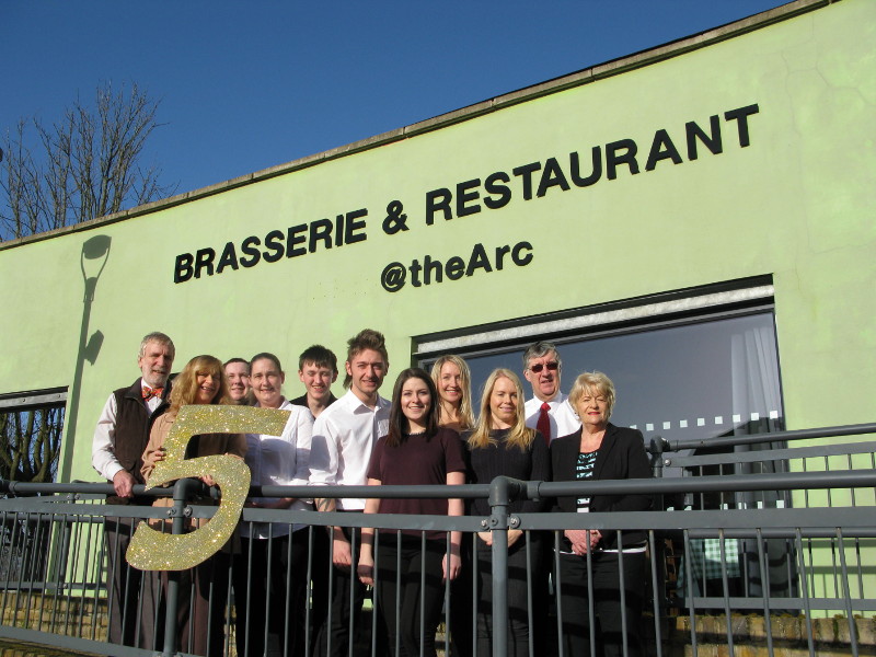 Celebrating five years at The Arc (from left):  Dick Moran, Beth Wood, Drew Small, Sarah Parker, Alistair Lindsay, Sergio Taddia, Lucy Devenport, Natasha Boast, Lisa Hickey, Robin Clements and Jenny Clements.