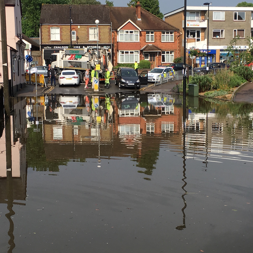 Chaldon Road becomes impassable to pedestrians and traffic following the downpour.